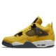 Кроссовки Nike Air Jordan 4 Retro желтые с черными вставками CT8527-700